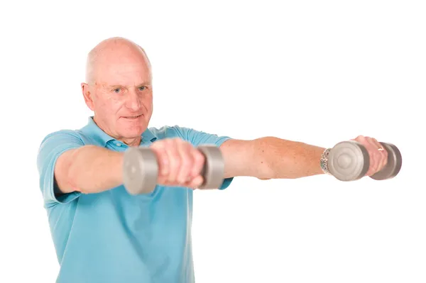 Älterer älterer Herr stemmt Gewichte — Stockfoto