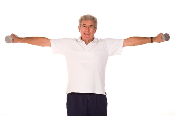 Mature older man lifting weights — Stock Photo, Image