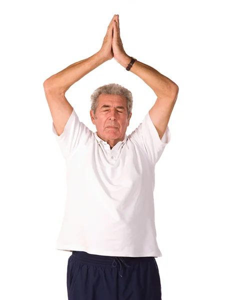 Uomo anziano maturo che fa yoga Fotografia Stock