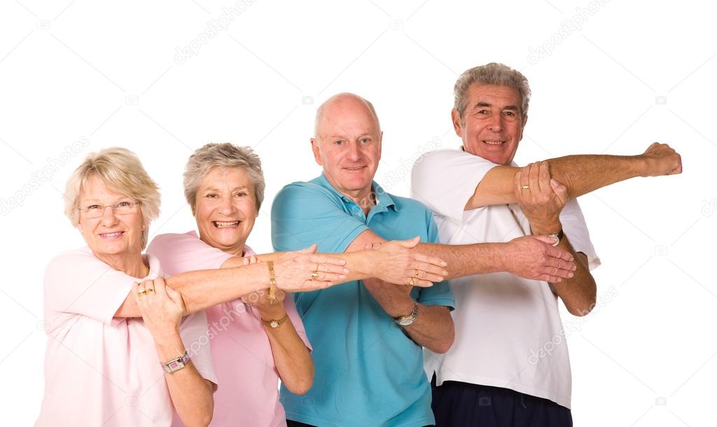 Group of mature people stretching