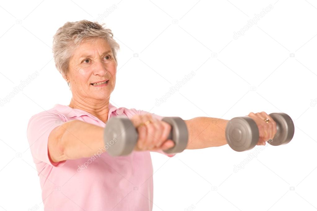 Older senior lady lifting weights