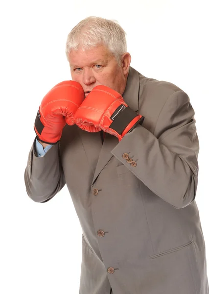 Successful mature businessman boxing — Stock Photo, Image