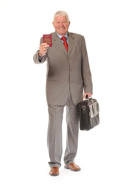 Erfolgreicher Geschäftsmann mit Pass und Aktentasche — Stockfoto
