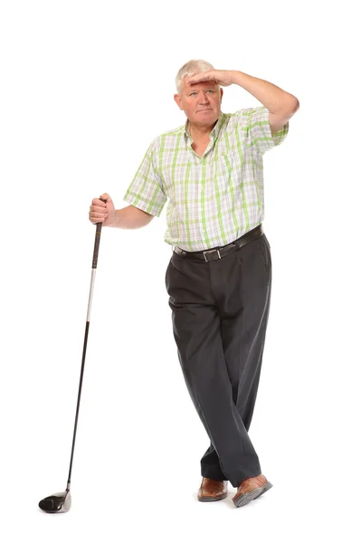 Gelukkig casual volwassen golfer, op zoek naar bal — Stockfoto