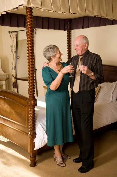 Senior couple celebrating — Stock Photo, Image
