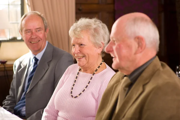 Older couples in restaurant — Stock Photo, Image