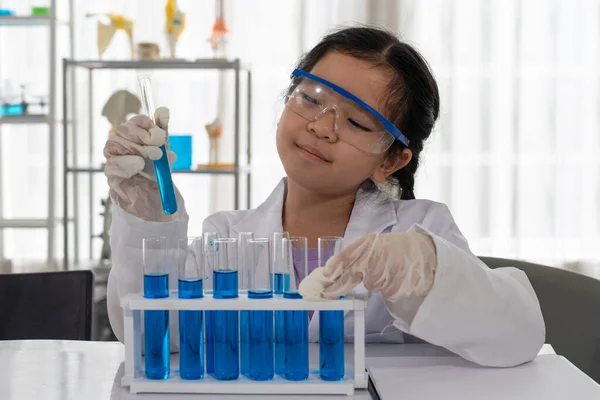 Portrait of Young Aisan Girl Learning Science in Laboratory