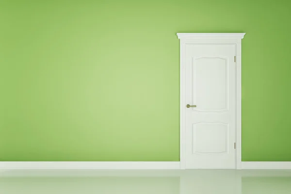 Zamknięte drzwi białe na zielony ściana — Zdjęcie stockowe