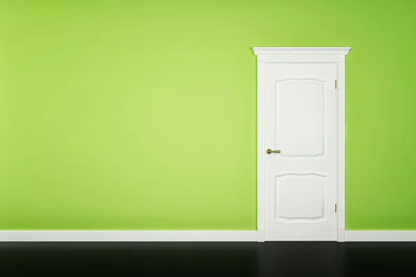 Puerta blanca cerrada en la pared verde —  Fotos de Stock