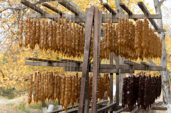 Churchkhela - doces tradicionais em forma de salsicha originários . Imagem De Stock