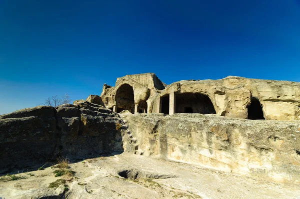 Uplistsikhe (doslovně, "pevnosti Páně") je starobylé skalní město ve východní Gruzie. — Stock fotografie