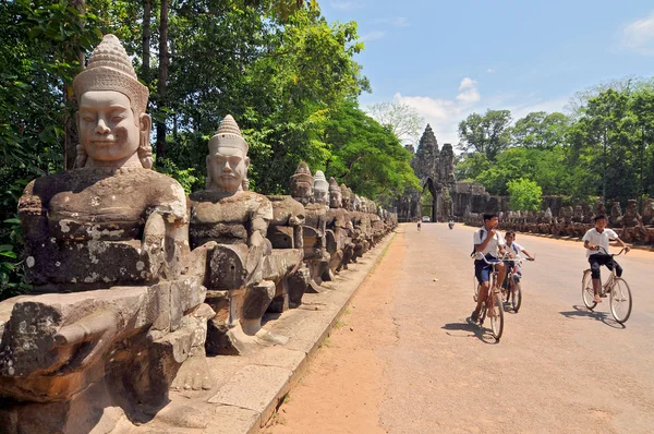 Giants Buddha Statues in Front South Gate of Angkor Tom Royalty Free Stock Images