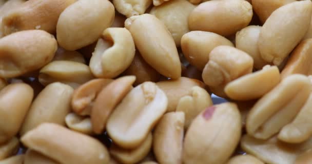 Erdnüsse Und Rosinen Einer Schüssel — Stockvideo