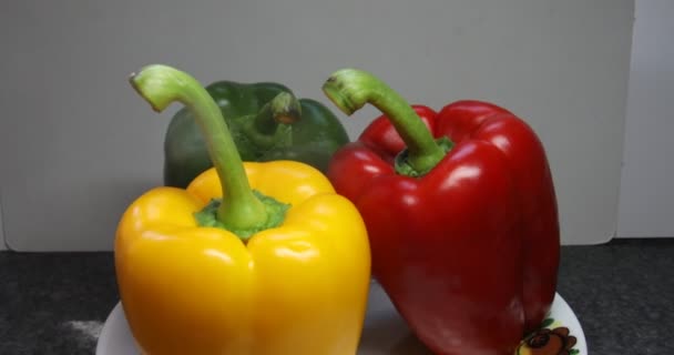 Red Yellow Green Stalk Peppers Rotate — Stock Video