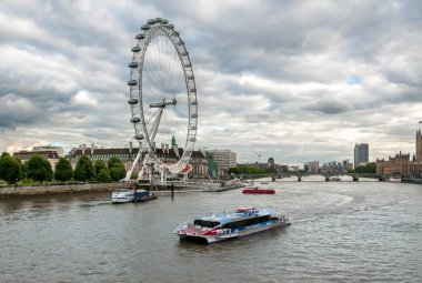 London, England, United Kingdom - September 18, 2013: View of the London Eye at sunset, is a cantilevered observation wheel on the South Bank of the River Thames in London.