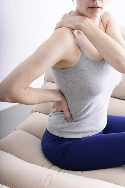 LOWER BACK PAIN IN A WOMAN — Stock Photo, Image