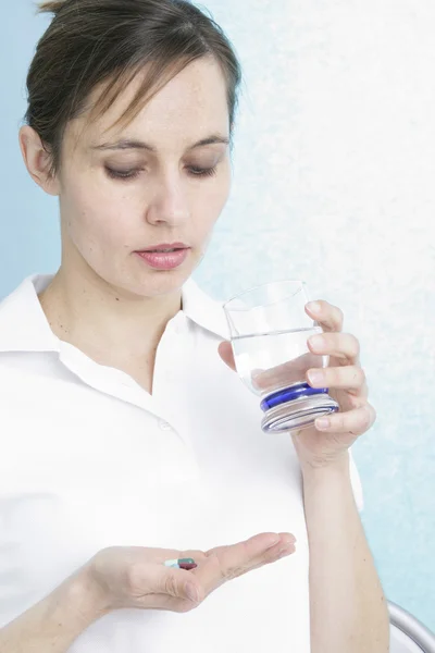 WOMAN TAKING MEDICATION — Stock Photo, Image