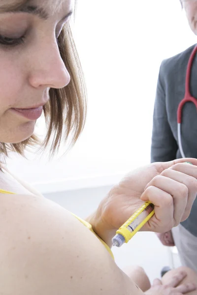 Woman give an injection — Stock Photo, Image