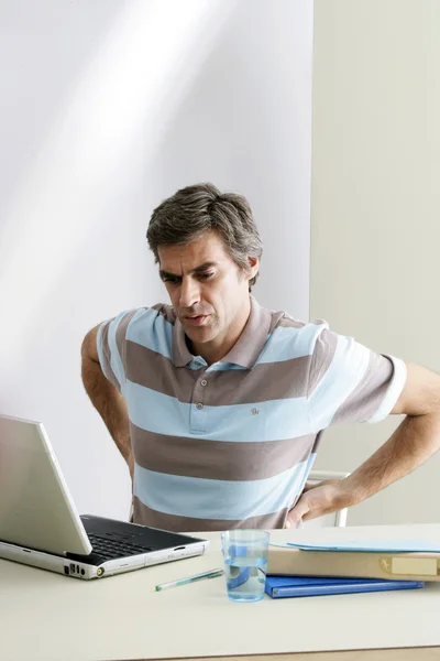 Dolor de espalda en un hombre —  Fotos de Stock