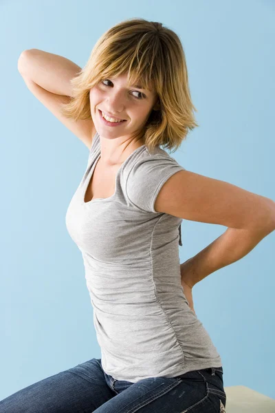 LOWER BACK PAIN IN A WOMAN — Stock Photo, Image