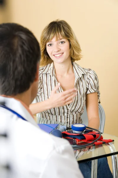 WOMAN AT HOSPITAL CONSULTATION — Stock Photo, Image