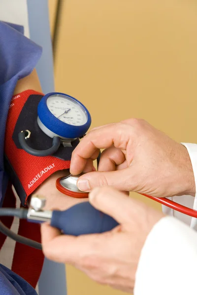 BLOOD PRESSURE, WOMAN — Stock Photo, Image