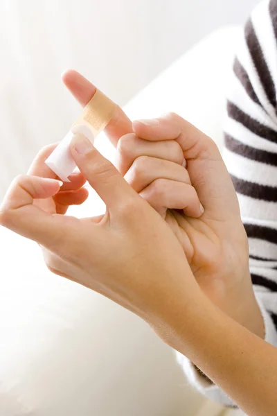 WOMAN with adhesive plaster — Stock Photo, Image