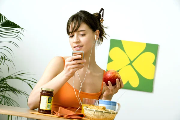 WOMAN EATING BREAKFAST — Stock Photo, Image