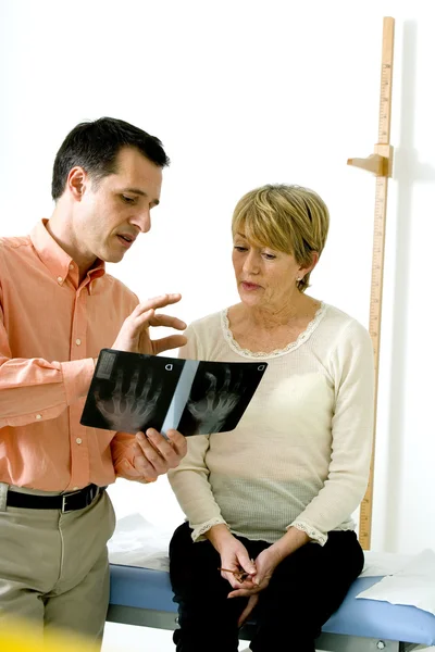 ELDERLY PERSON IN CONSULTATION — Stock Photo, Image