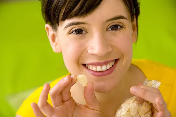 WOMAN EATING SWEETS — Stock Photo, Image