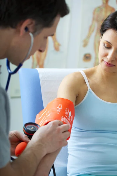 BLOOD PRESSURE, WOMAN — Stock Photo, Image