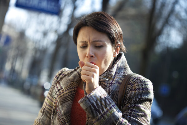 WOMAN COUGHING
