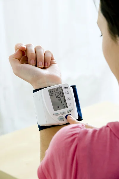 BLOOD PRESSURE, WOMAN Stock Picture