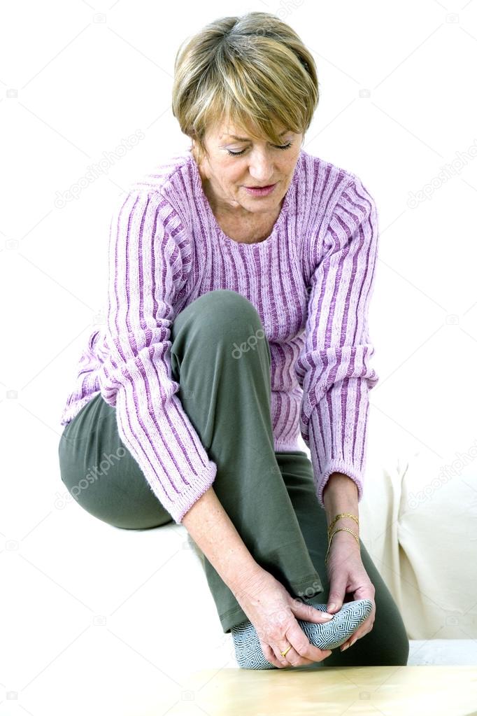 FOOT PAIN ELDERLY PERSON Stock Photo by ©imagepointfr 42531037