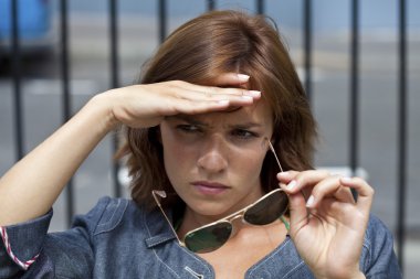 PHOTOPHOBIA IN A WOMAN clipart