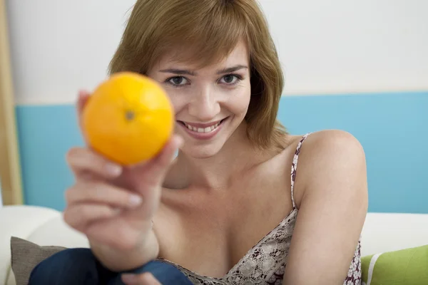 WOMAN EATING FRUIT — Stock Photo, Image
