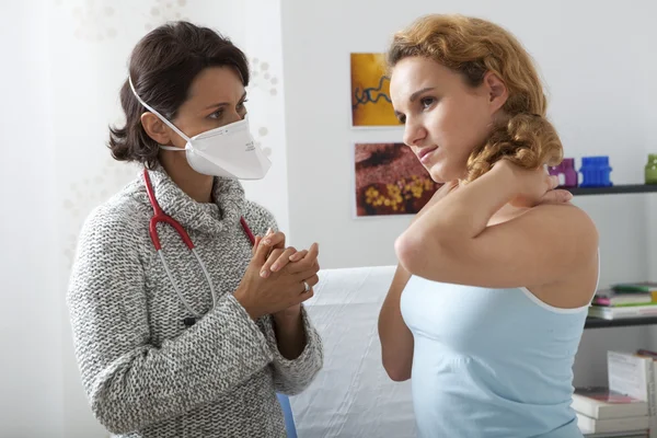 CONSULTATION, WOMAN IN PAIN — Stock Photo, Image