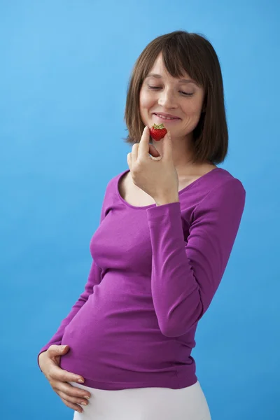 PREGNANT WOMAN EATING — Stock Photo, Image