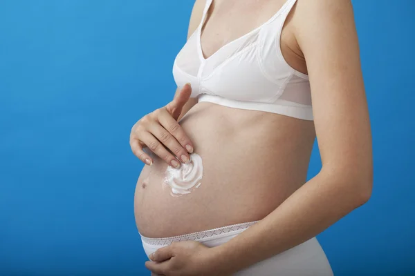 Беременная женщина, уход — стоковое фото