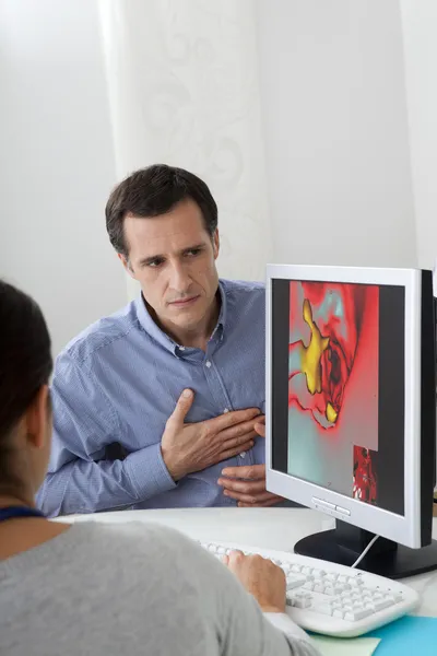 CONSULTA DE CARDIOLOGÍA HOMBRE —  Fotos de Stock