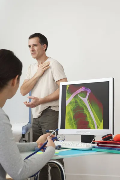 ORTHOPEDICS CONSULTATION MAN — Stock Photo, Image