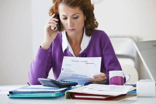 WOMAN DOING PAPERWORK — Stock Photo, Image