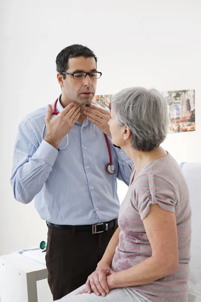 ELDERLY PERSON IN CONSULTATION — Stock Photo, Image