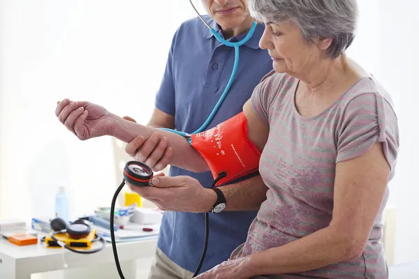 BLOOD PRESSURE, ELDERLY PERSON — Stock Photo, Image