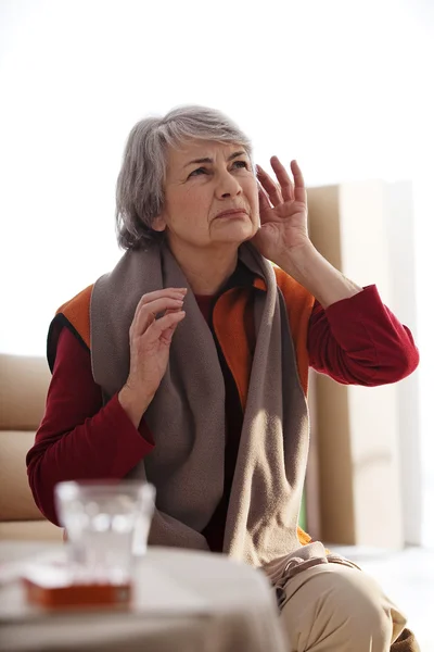 HEARING-IMPAIRED ELDERLY PERSON — Stock Photo, Image