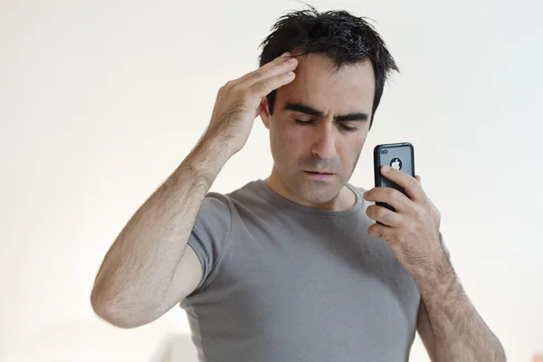 Hombre con dolor de cabeza — Foto de Stock