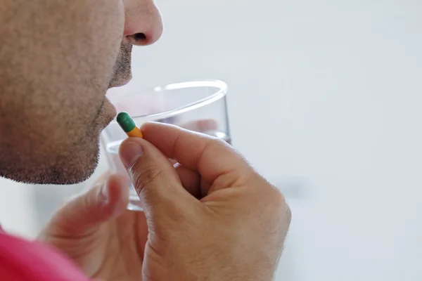 MAN TAKING MEDICATION — Stock Photo, Image