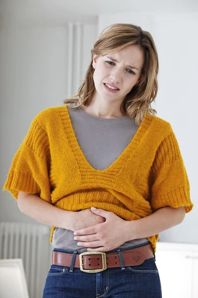 ABDOMINAL PAIN IN A WOMAN — Stock Photo, Image