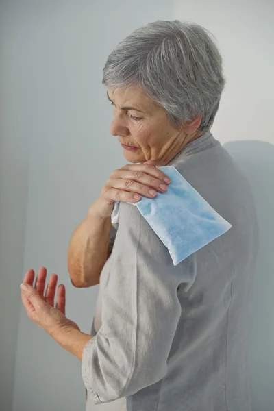 Heiße Therapie ältere Person — Stockfoto