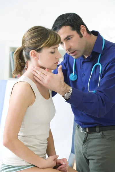 WOMAN PALPATING LYMPH NODE — Stock Photo, Image